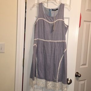 Denim dress with crochet bottom
